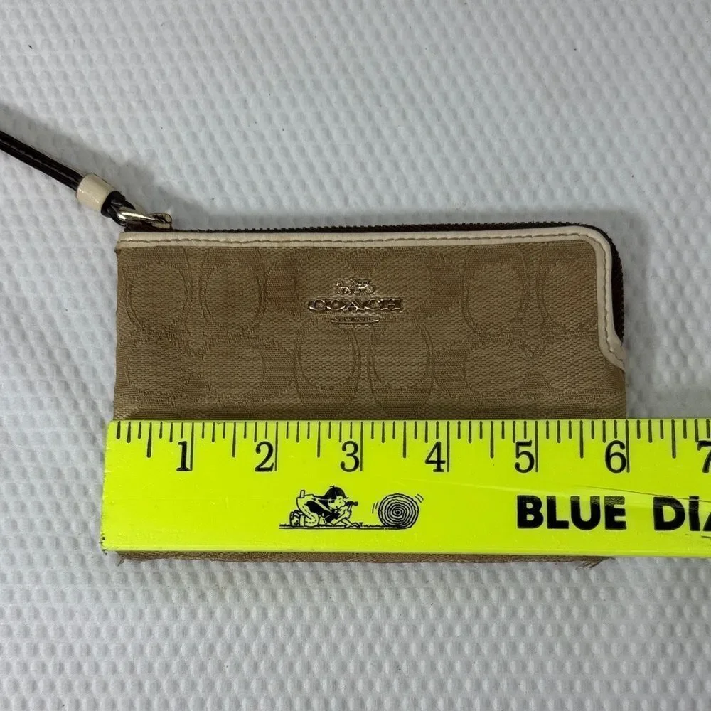 Coach Beige Wristlet with Logo Pattern
